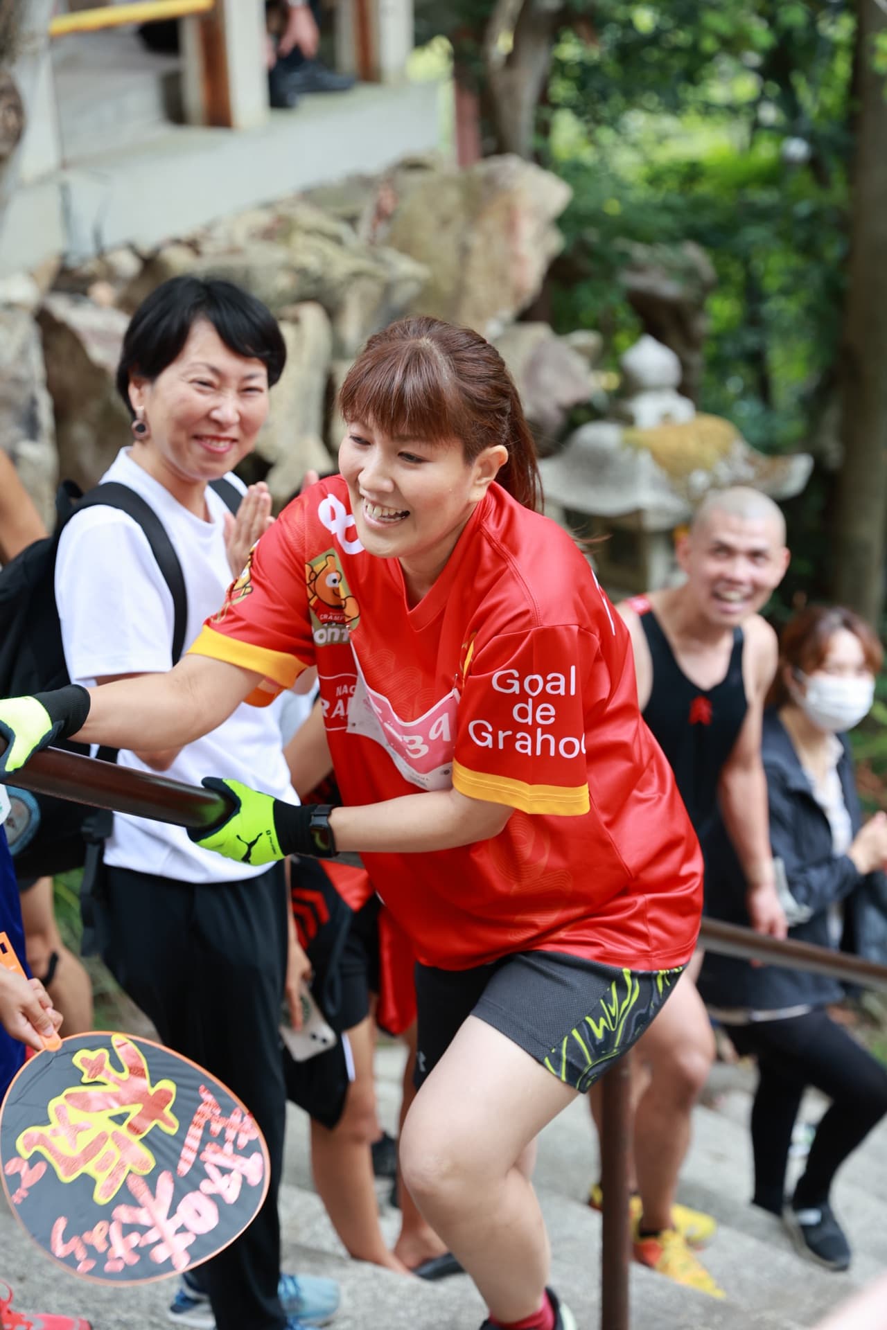 Runner smiling at the finish